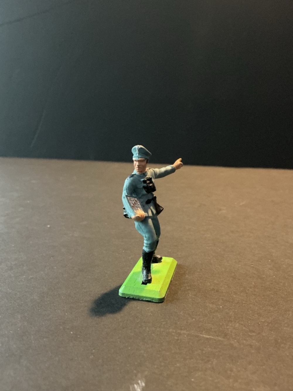 Vintage-Style Toy Soldier Figurine in Teal Uniform